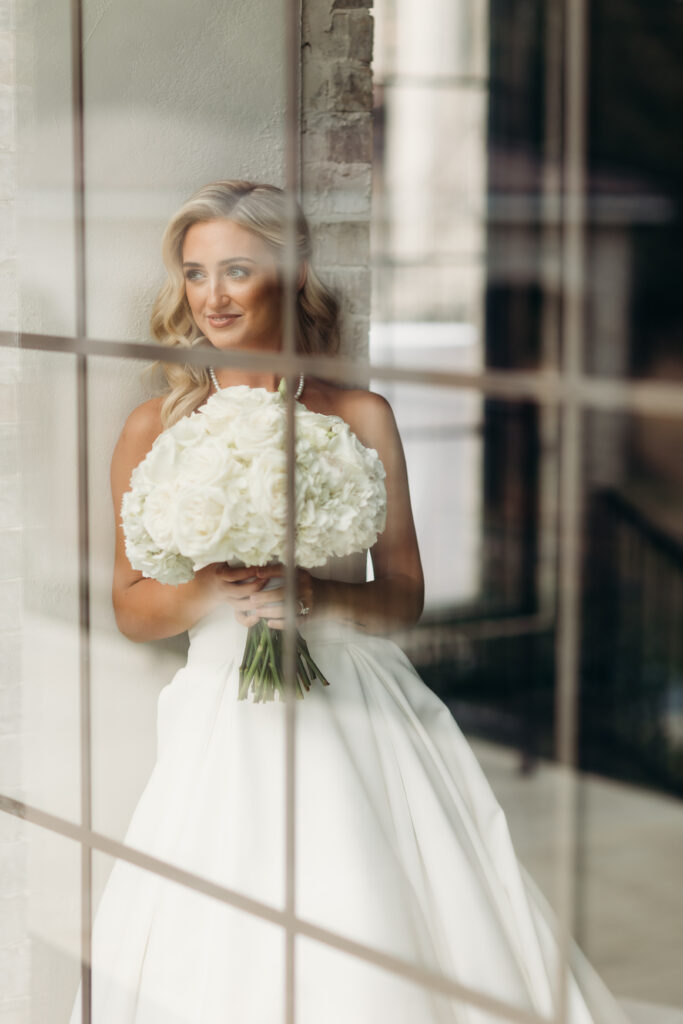 Fort Worth wedding venue groom in cocktail attire