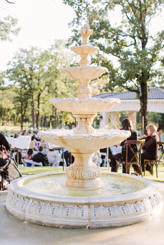 DFW wedding venue near Fort Worth with luxury mansion fountain and outdoor wedding ceremony