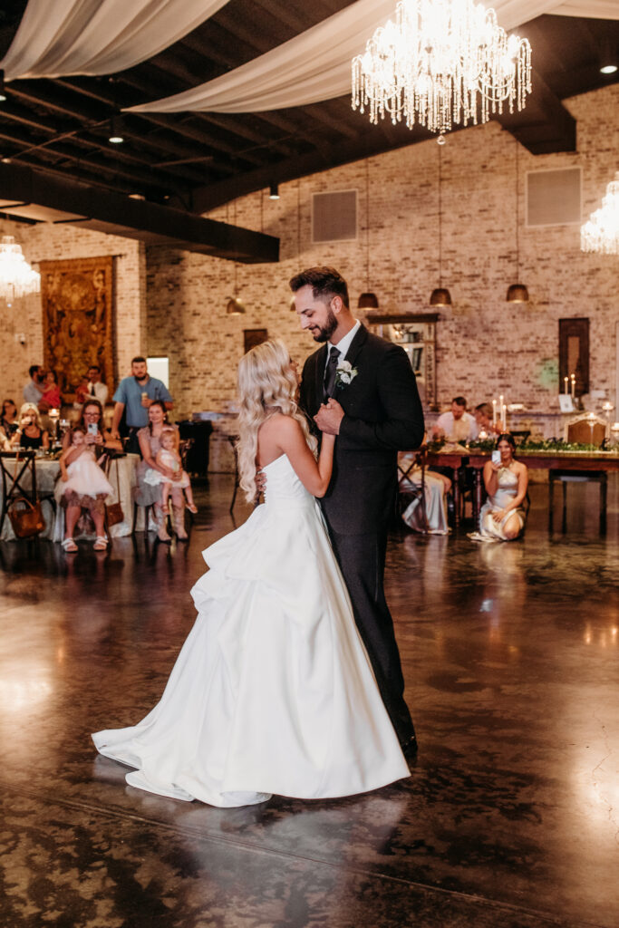 Fort Worth Wedding venue luxury bride and groom dancing at their European villa style wedding reception