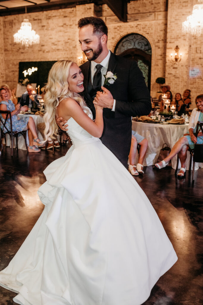 Fort Worth Wedding venue luxury bride and groom dancing at their European villa style wedding reception