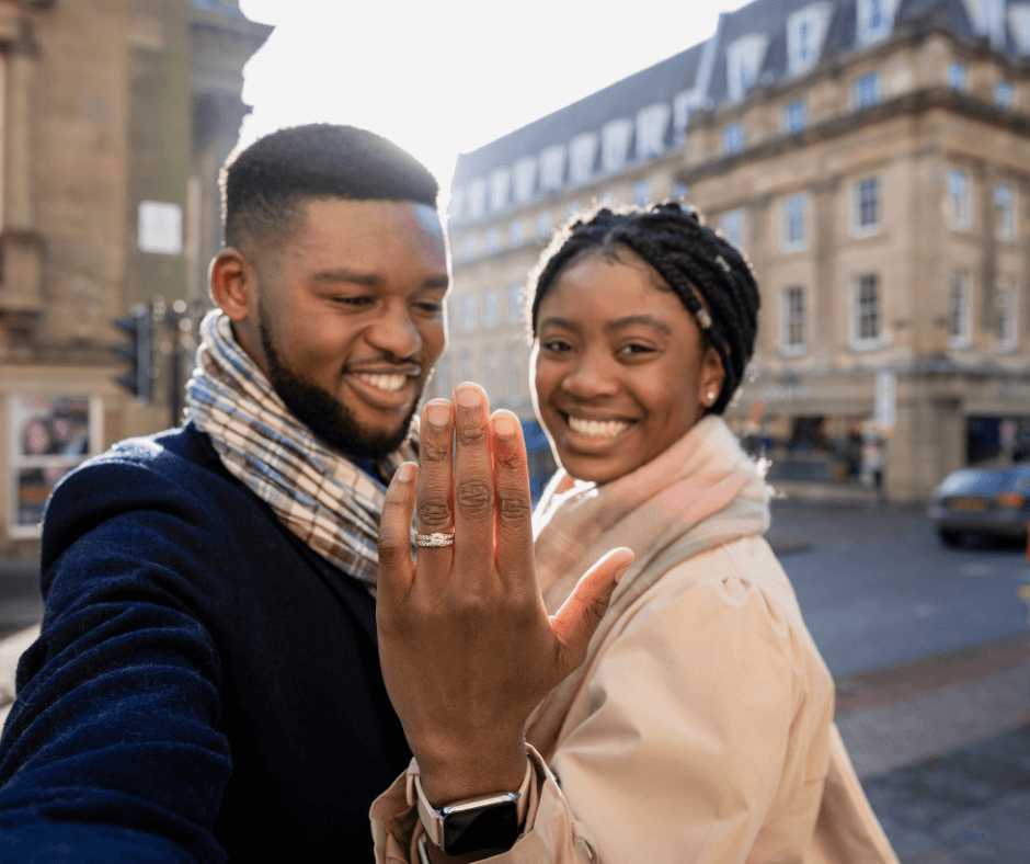 Newly engaged couples showing on engagement ring during a date night in Fort Worth