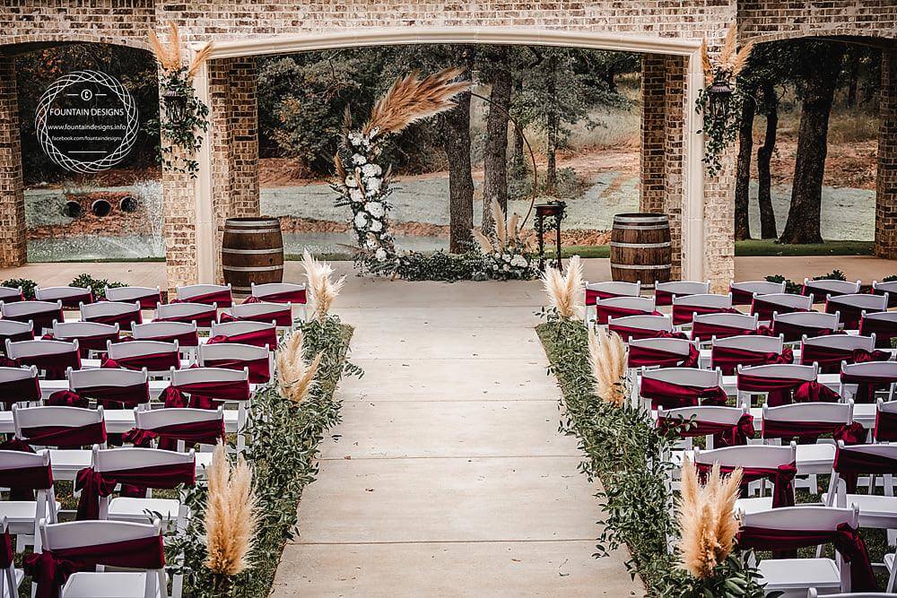 Matron of honor helping the bride in the European‑inspired bridal suite at La Bella Luna.

