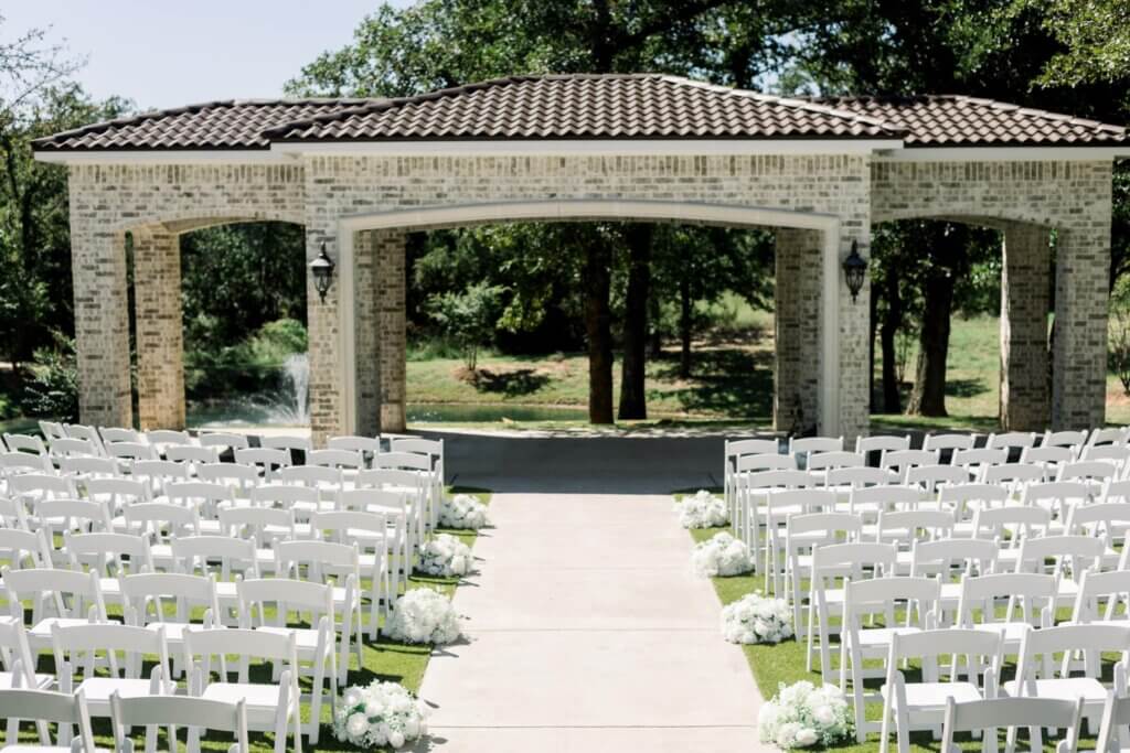 Beautiful wedding venue near Fort Worth with outdoor ceremony and luxury wedding flowers