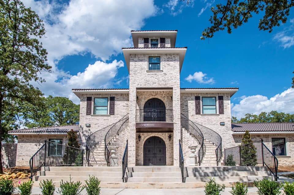 Spring day at an elegant mansion wedding venue near Fort Worth featuring secret garden, pond, fountain, indoor receptions with luxurious decor & design features. 